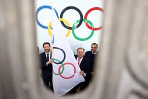 AFP 20260223 98N38V6 v4 HighRes FranceOlyMilanoCortina2026FrenchAlps2030