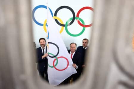 AFP 20260223 98N38V6 v4 HighRes FranceOlyMilanoCortina2026FrenchAlps2030